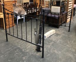 A modern black painted metal double bed, 143cmW, the head 122cmH