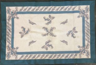 An E&E designs rug in a pale blue and cream pattern, 182x122cm