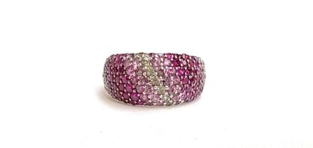 An Effy 925 sterling silver ring pave set with rubies and pink and white sapphires, size Q 1/2, 6.2g