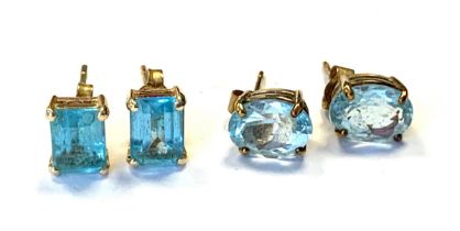 A pair of 14ct gold emerald cut blue topaz stud earrings, 0.7cmL; together with a further pair of