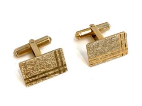 A pair of 9ct gold cufflinks with engraved design, gross weight 9.7g