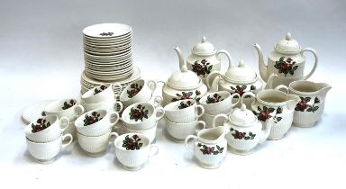 A Wedgwood 'Moss Rose' part tea set, comprising two teapots, two coffee pots, a smaller teapot, milk