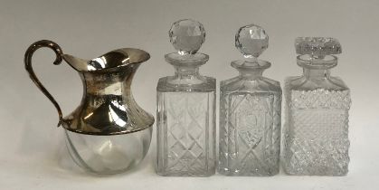 A Saint Hilaire silver plate and glass water jug, 21cmH, in box; together with three square cut