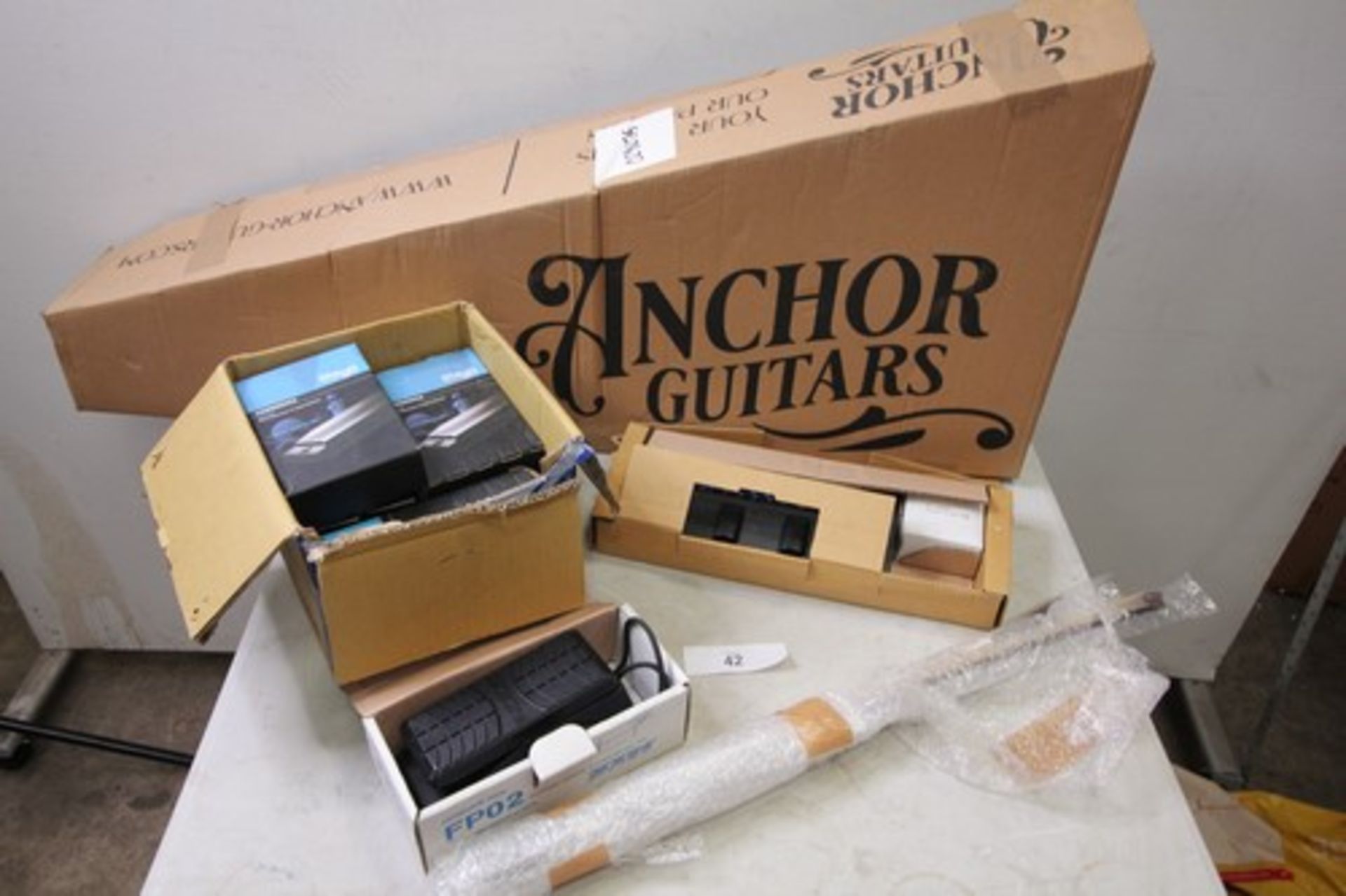 1 x Anchor Berlin acoustic guitar together with Zoom 2001 effects pedal and 7 x Stagg harmonicas -