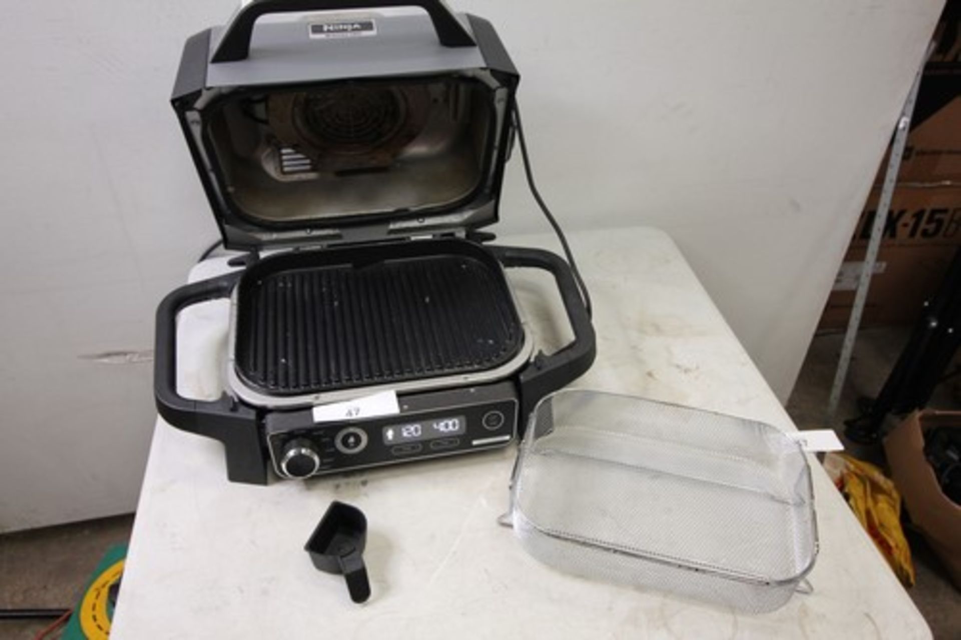 1 x Ninja wood fire outdoor electric grill, model OG701UK, powers on but not fully tested - Used (