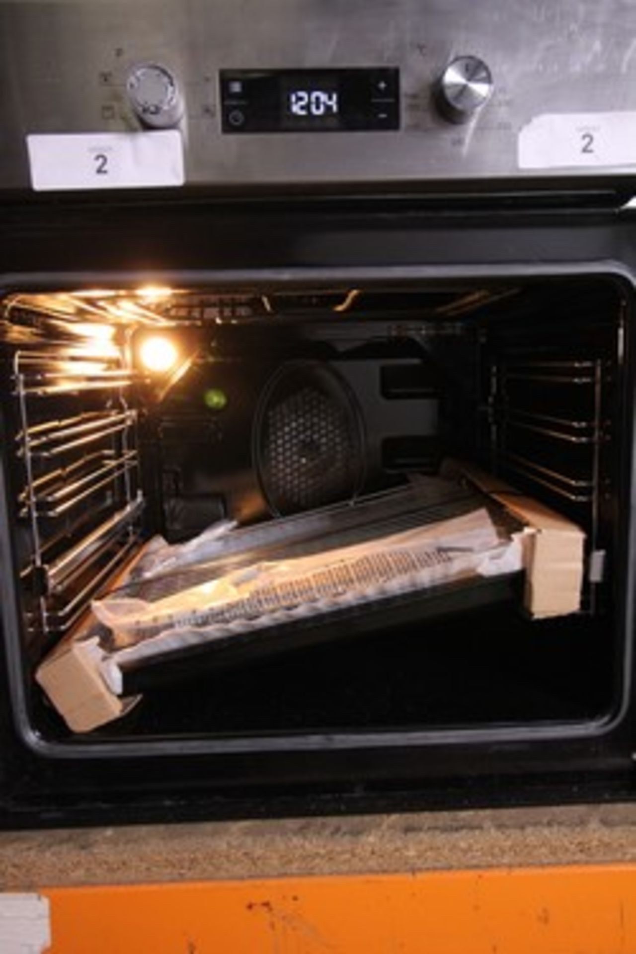 1 x Beko stainless steel fan assisted oven, model BIF22300XR, with shelves and trays. Powers on - Image 2 of 6