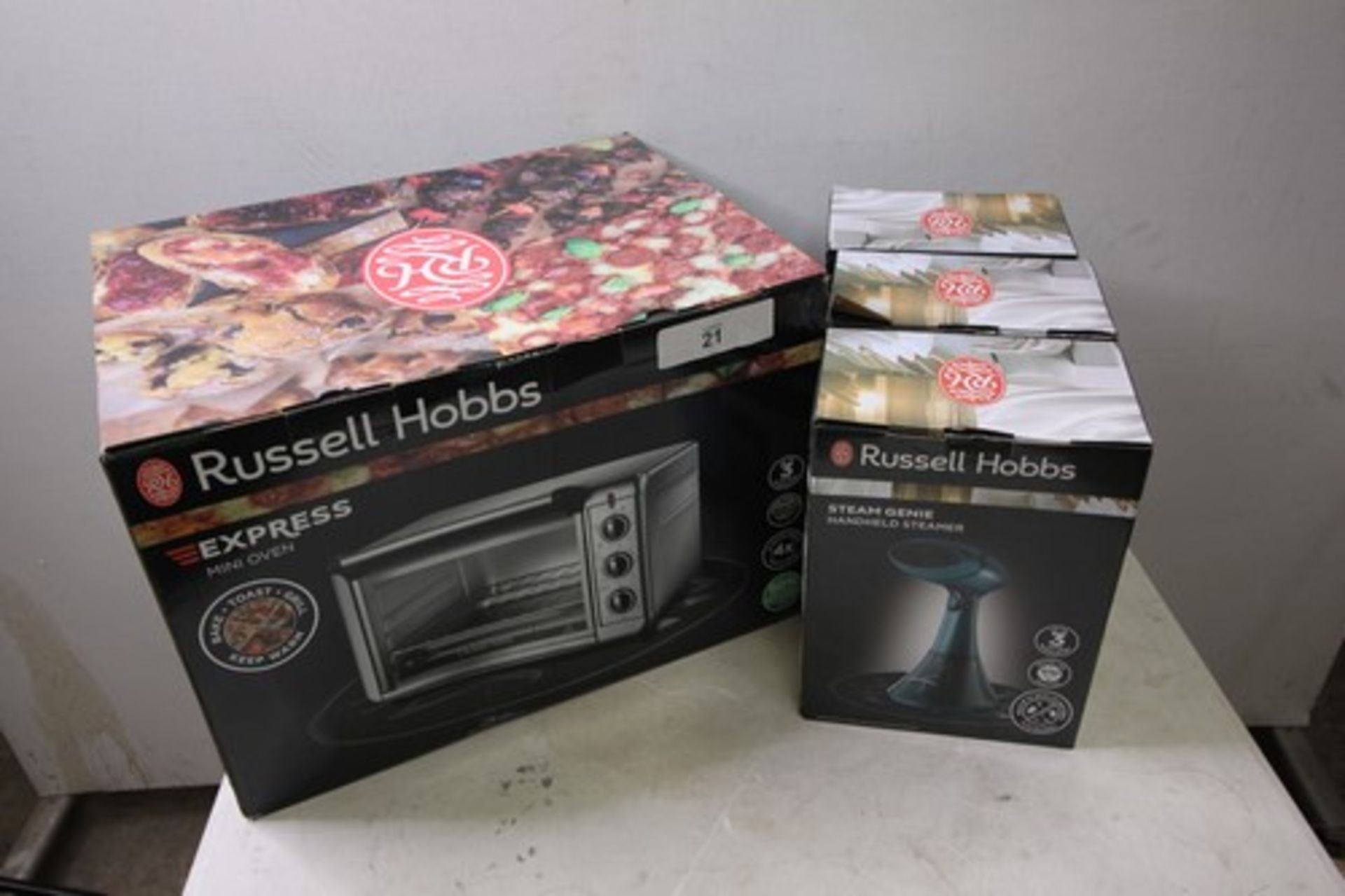 1 x Russell Hobbs Express mini oven, model 26090 and 3 x steam genie's clothes steamers - New in box