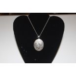 A large Sterling silver locket and chain, marked 1