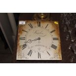 A Staples Odiham clock face and movement