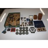 A box containing various token, reproduction campa