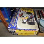 Two Nigel Mansell Scalextric sets (unknown if comp