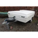 A Camp-Let fibreglass single axle ex-camping trail