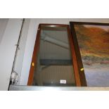 A teak effect oblong wall mirror