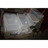 A quantity of plastic storage crates