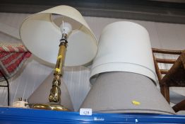 A brass table lamp and shade, and a quantity of la