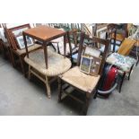 A wicker side table, a teak side table and an oak