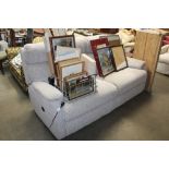 An electric reclining settee