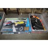 A boxed Scalextric set together with a box of vari