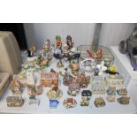 A collection of various model cottages, churches e