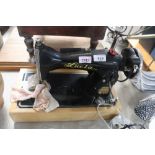 A Lucia electric sewing machine lacking case