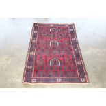 An approx 4'6" x 2'8" Balochi rug