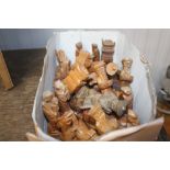 A box of carved wooden chess pieces - some AF