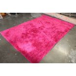 An approx 10' x 6'8" modern wool rug