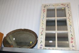 A floral painted window mirror; and a gilt framed