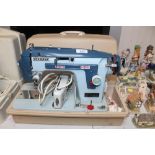 A New Home sewing machine sold as a collectors ite