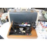 An Arrow electric sewing machine, sold as collecto