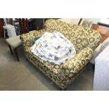 A Victorian drop end two-seater sofa with floral u