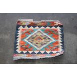 An approx 1'4" x 1'6" Chobe Kilim rug