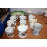 A quantity of commemorative mugs, bowls etc.