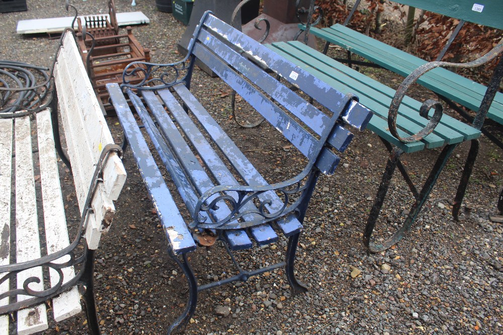 A wooden and metal garden bench