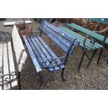 A wooden and metal garden bench