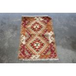 An approx 2'7" x 1'9" Mamana Kilim rug