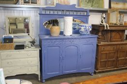 A blue painted mirrored back sideboard