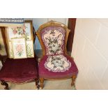 A late Victorian walnut framed nursing chair with
