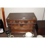 A mahogany miniature chest fitted five short and t