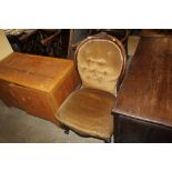 A Victorian walnut framed nursing chair