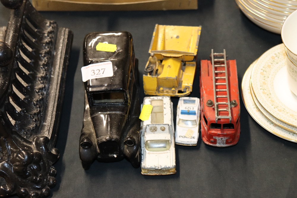 Four old play worn diecast vehicles and another to