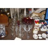 A collection of various table glassware to include