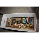 A box of various ale pump signs