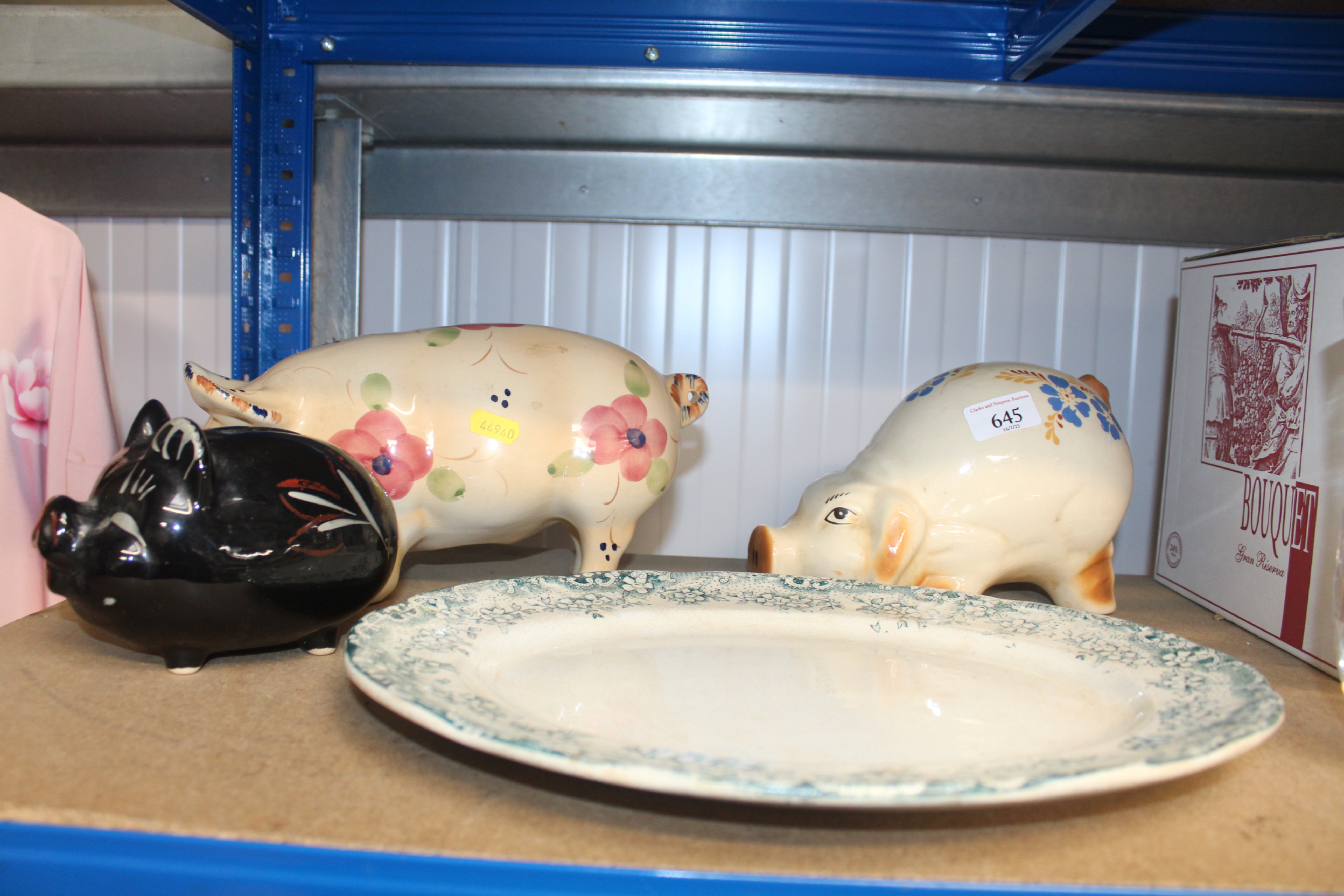 A Hudson meat plate; a pig ornament and two piggy