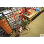 A gas bottle trolley; acetylene torch; welding mas