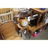 A plant stand with attached clock and a Dutch styl