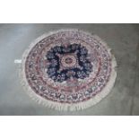 Approx. 4'4" diameter circular patterned rug