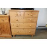 A stripped pine chest fitted two short over three