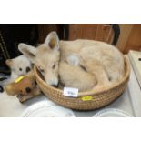 A taxidermy fox cub and two model koala bears