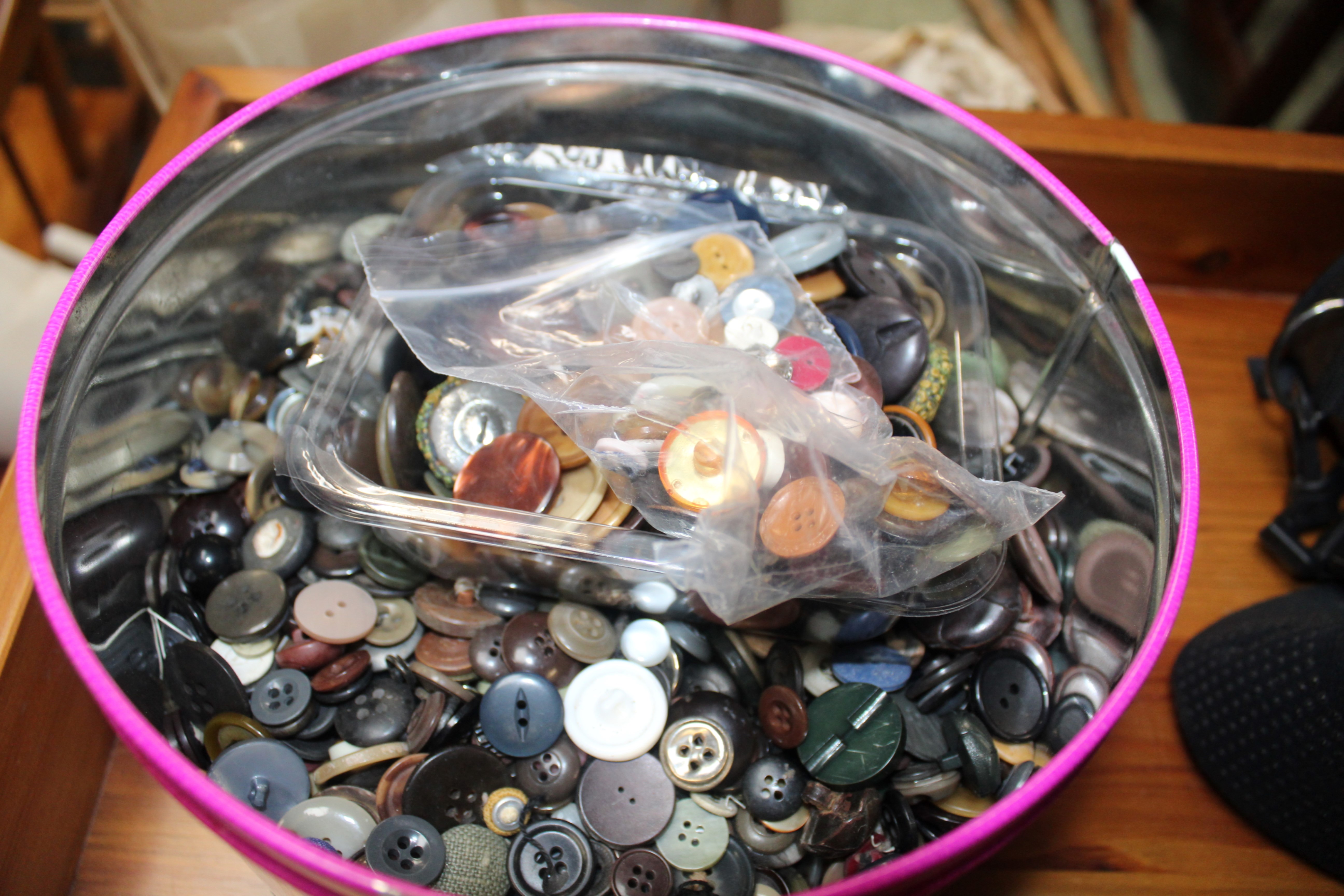 A tin of buttons
